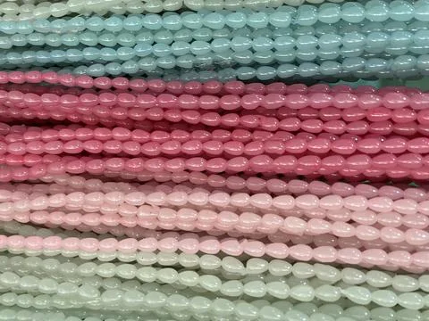 String of beads in various colors. yellow red, blue, green Stock Photos