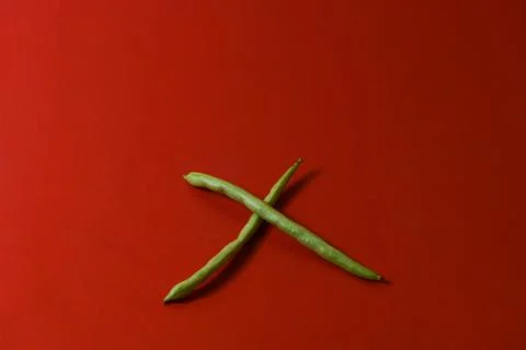 String beans fresh vegetables on isolated red background Stock Photos