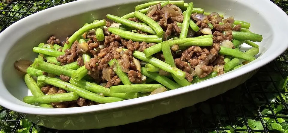 String green bean or french beans with minced beef stir fry or sauteed call.. Stock Photos