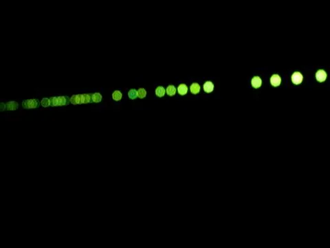 String of green lights 스톡 사진