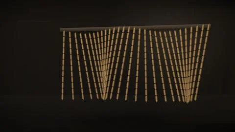 A string of hanging beaded curtains displayed against a dark background, sh.. Stock Footage 346723389