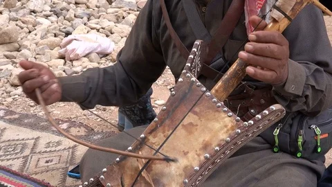 String instrument played by Bedouin in Petra in Jordan Stock Footage 71516328