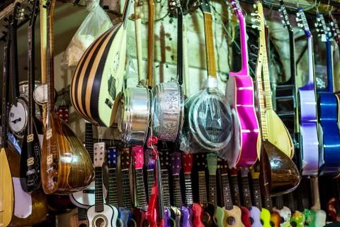 String instruments in the store. Stock Photos