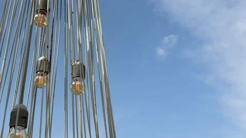 String lights against a blue sky background with space for text on the righ.. Stock Footage 330536702