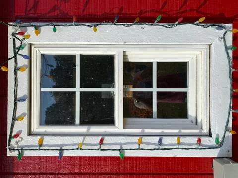 String Lights on Barnyard Window Stock Photos