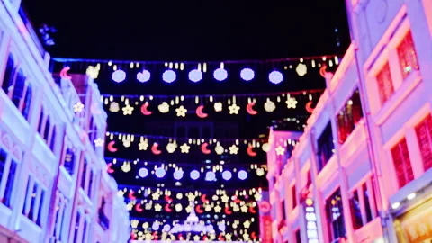 String of lights between buildings in guangzhou, china Stock Footage 327244835