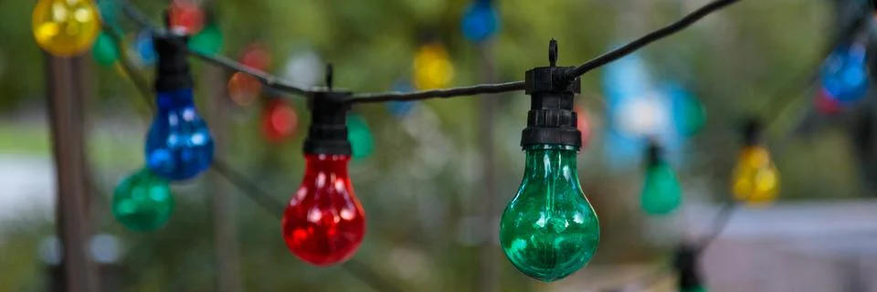 String lights with color lightbulbs Stock Photos