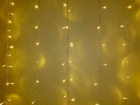String lights on gold background Stock Photos