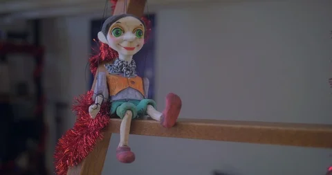 String operated handmade ceramic puppet (marionette) from Prague (Czech Stock Footage 121878746