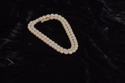 String of Pearls on black Foto stock