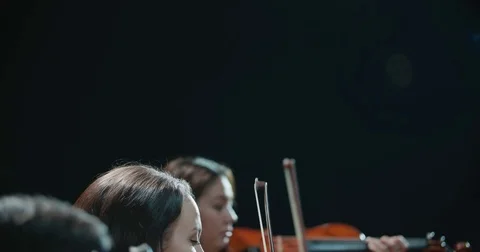 String quartet performs on stage, close-up of violin in work Stock-Footage 85044862