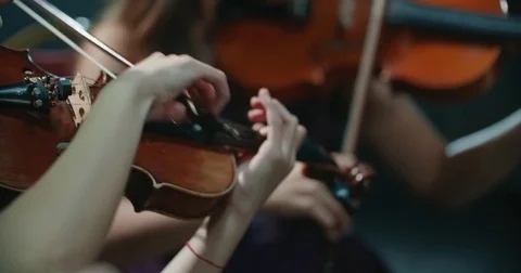 String quartet performs on stage, close-up of violin in work Stock Footage 85045191