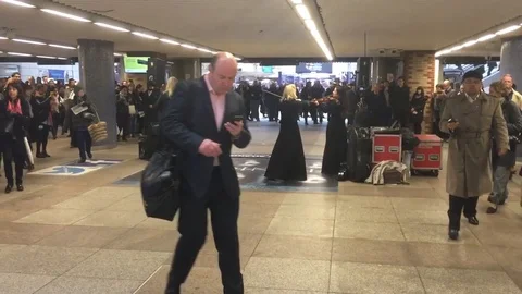 String quartet play Game of Thrones theme at Liverpool Street Station, London Stock Footage 109391100