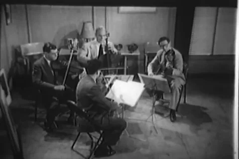 String quartet play music for kids - 1957 Stock Footage 110931308
