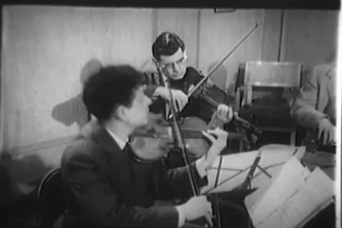 String quartet play music for kids - 1957 Stock Footage 110931499