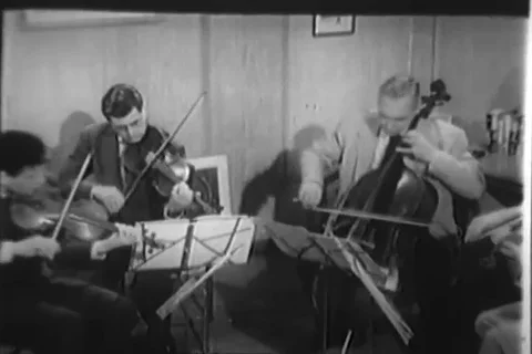 String quartet play music for kids - 1957 Stock Footage 110931549