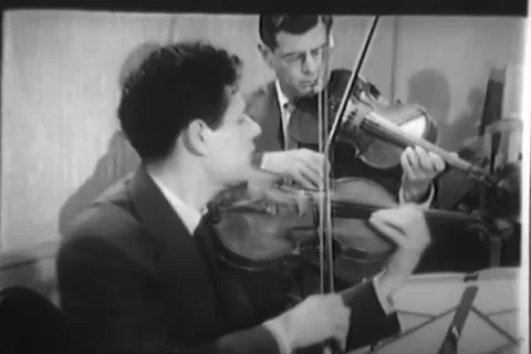String quartet play music for kids - 1957 Stock Footage 110931553