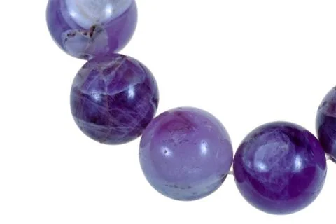 String of round blue amethyst beads Stock Photos