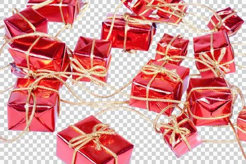 String of small decorative Christmas presents at a golden rope, transparent b Stock Photos