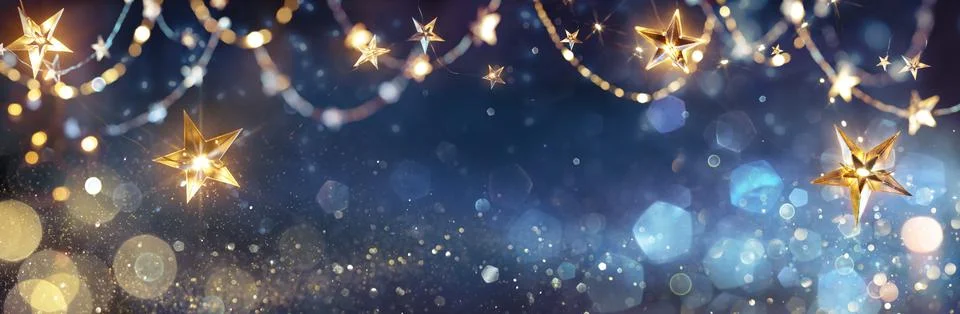 String Star Lights In Blue Defocused Abstract Background Stock Photos