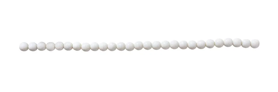 String of white beads isolated on white background Stock Photos