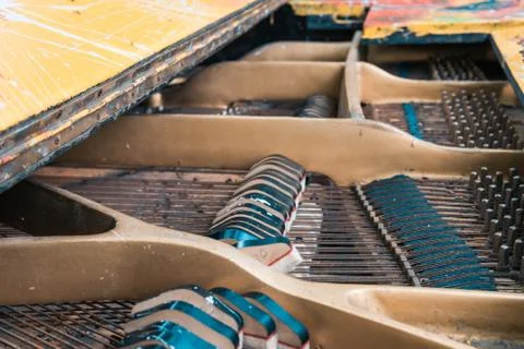 Strings and hammers inside the old piano Stock Photos