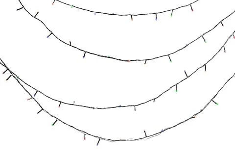 Strings of Christmas lights on white background Stock Photos