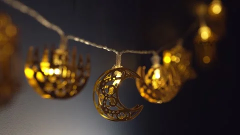 Strings of fairy lights twinkle, symbolizing the blessings of the holy month. Stock Footage 318694308