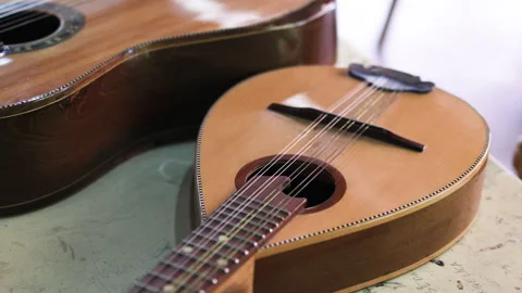 The strings of handcrafted mandolin have rusted from the humidity. Stock Footage 322045311