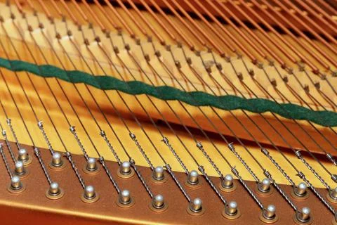 Strings inside the pianoforte mechanism Stock Photos
