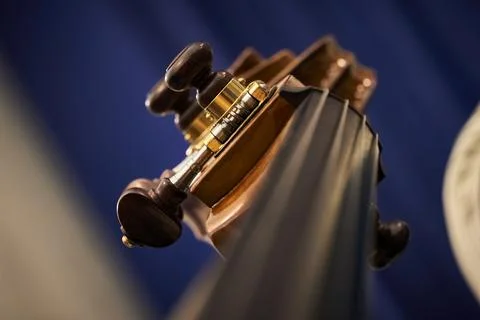 Strings of an old contrabass closeup with background Stock Photos