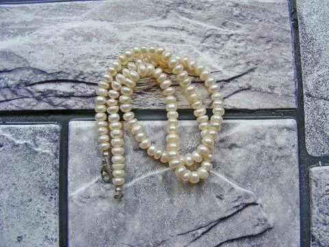 Strings of white pearl Stock Photos