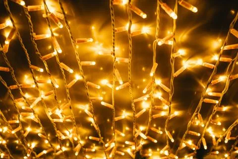 Strings of yellow Christmas lights Stock Photos