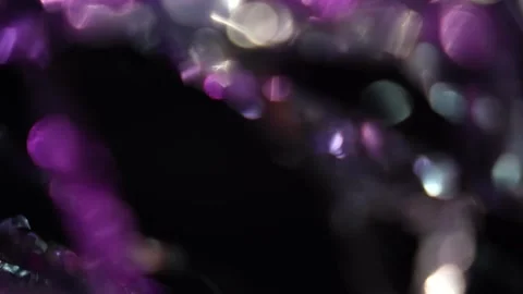Stringy bokeh lights and zooming seven-color bokeh lights in the background Stock Footage 315318408