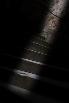 The strip of light on the old staircase Stock Photos