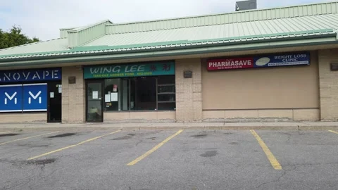 Strip mall tracking shot 4K Stock Footage 136908487