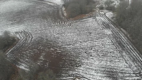 Stripe Pattern on Snow Covered Field, Farm Concept, Aerial Stock Footage 149005148