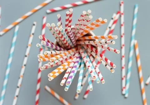 Striped and dotted paper drinking straws top view Stock Photos