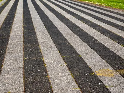 Striped Asphalt Pathway with Bold Linear Pattern Stock Photos