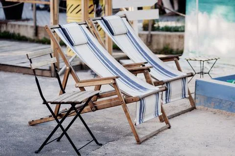 Striped beach chairs Stock Photos