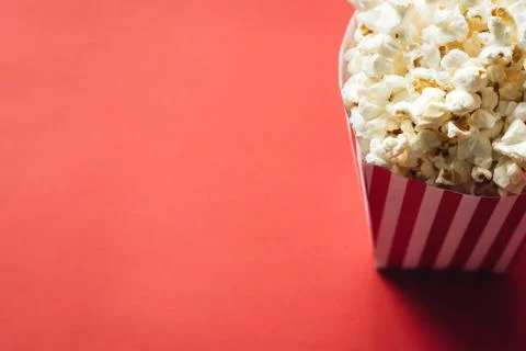Striped box with popcorn Stock Photos