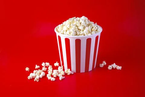 Striped box with popcorn Stock Photos