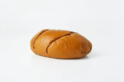 Striped brown bread on a white background Stock Photos