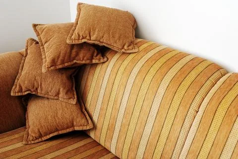 Striped brown sofa Stock Photos