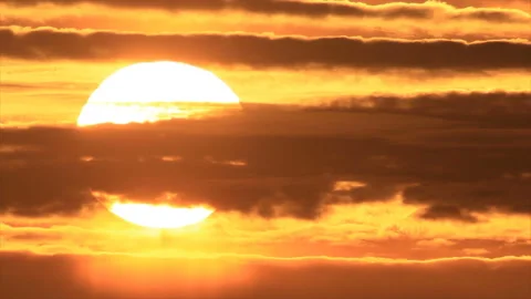 Striped clouds in sunset sky Stock Footage 146060724