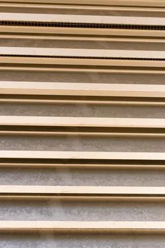 Striped construction texture. The walls are paneled in beige stripes. Backg.. Stock Photos
