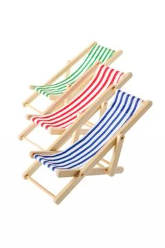 Striped deck chairs Stock Photos