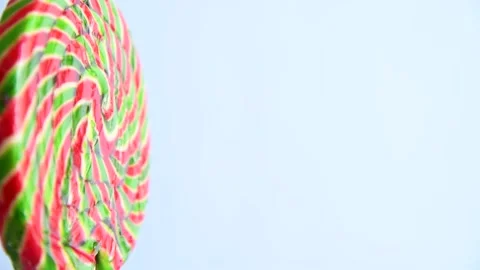 Striped fruit lollipop Stock Footage 199837029
