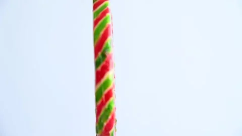 Striped fruit lollipop Stock Footage 199837151