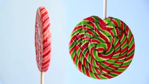 Striped fruit lollipops Video stock 199836862
